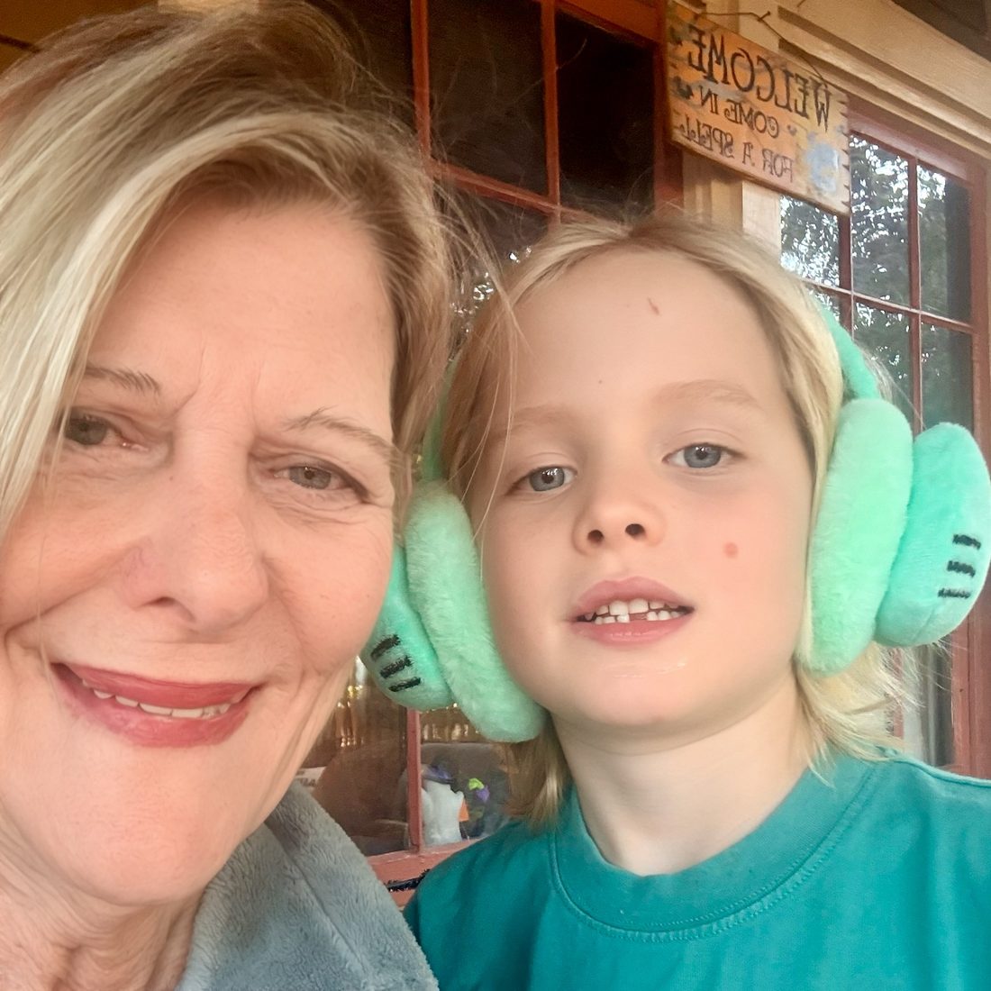 Cindy and a little one in green earmuffs