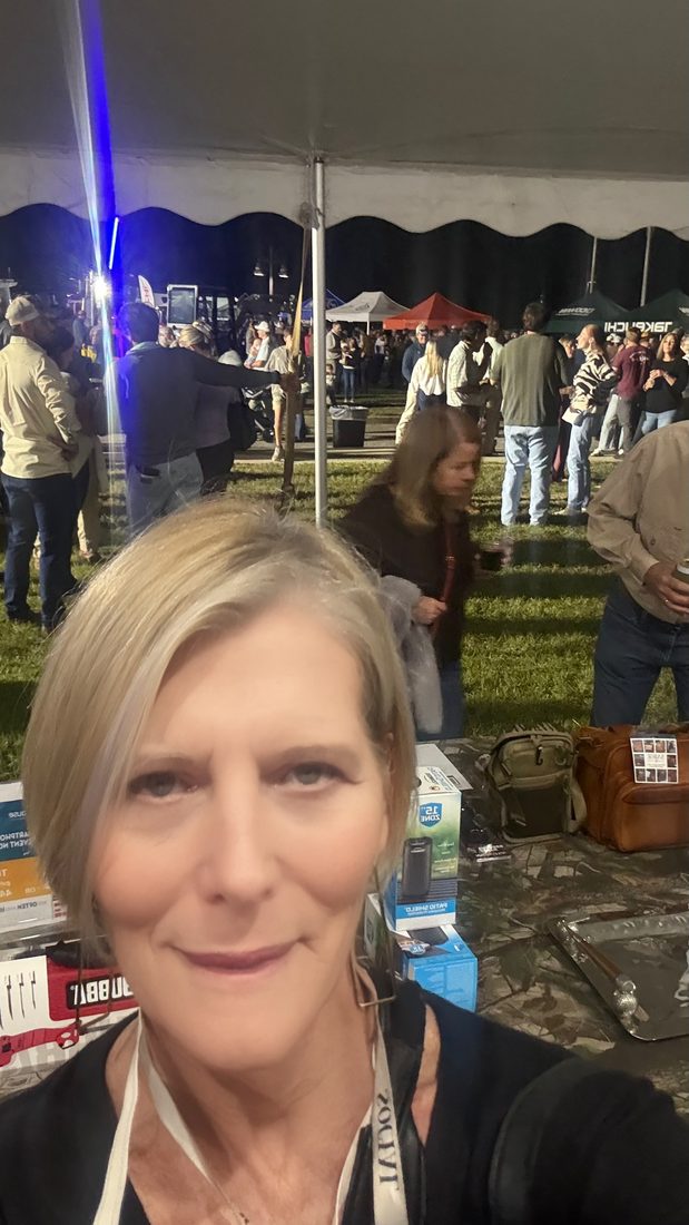 Cindy at an evening event under the tent
